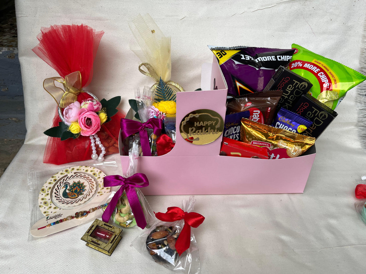 Customised Rakhi chocolate hamper with bhai bhabhi rakhi and roli chawal